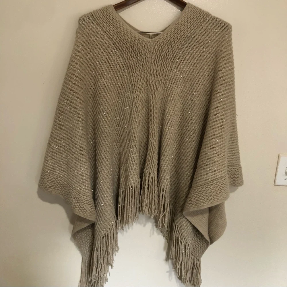 Tan knitted metallic gold fringe hem poncho
